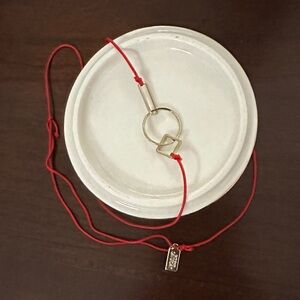 Kate Spade Saturday Red Cord Necklace with Brass Charm